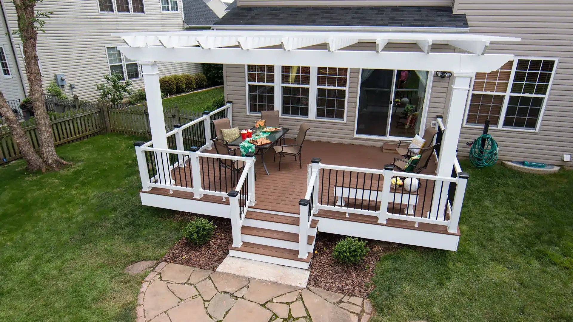 Attached Trex Pergola with motorized canopy